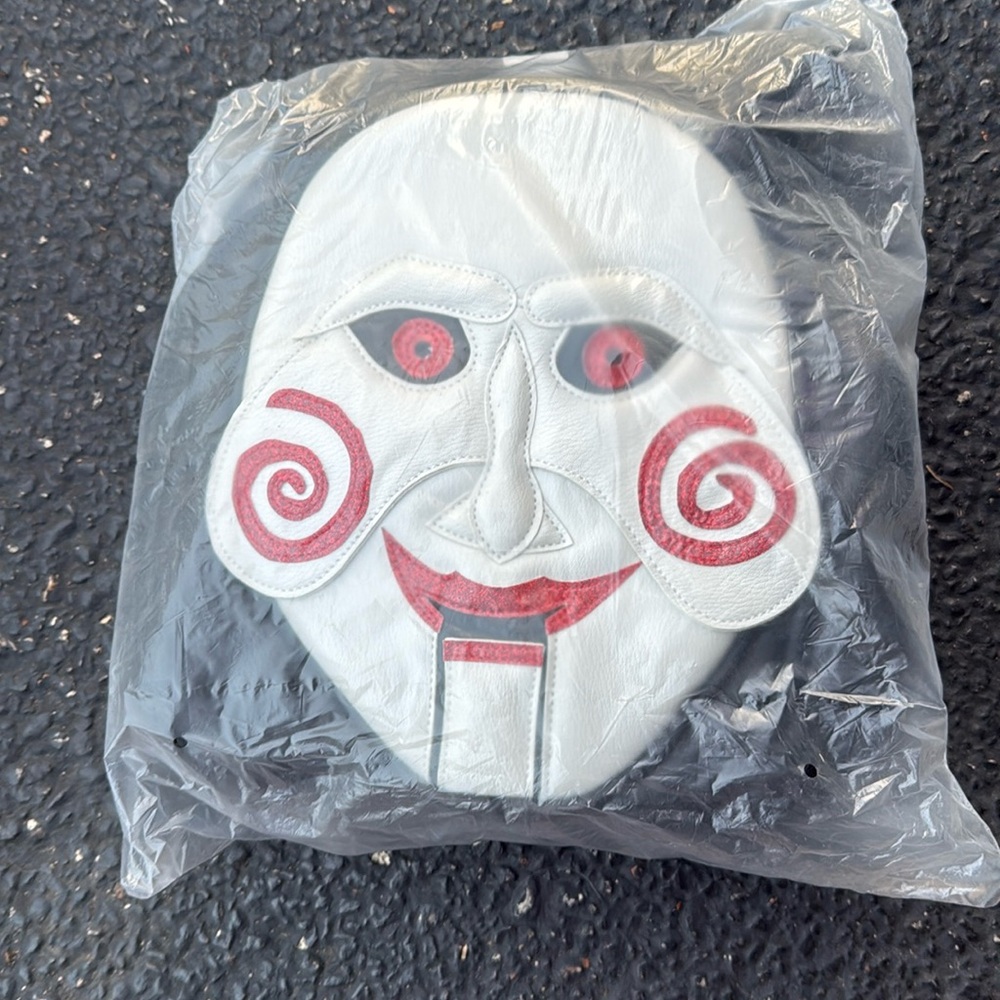 Saw Billy smiles handbag in OG shipping material.
